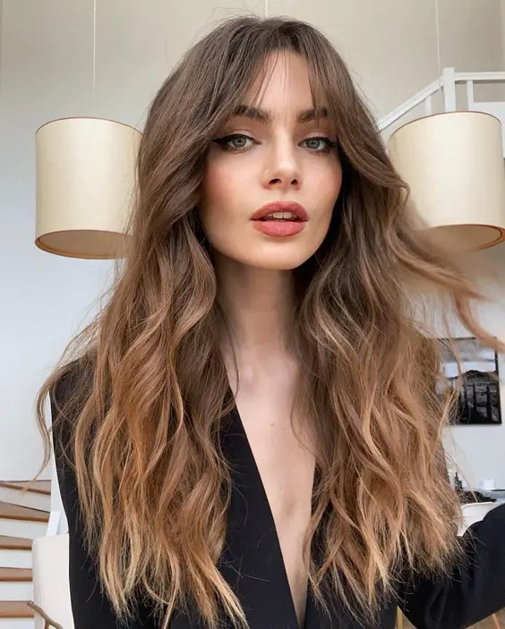 20 Top Wavy Hair with Bangs Styles for Every Face Shape and Length