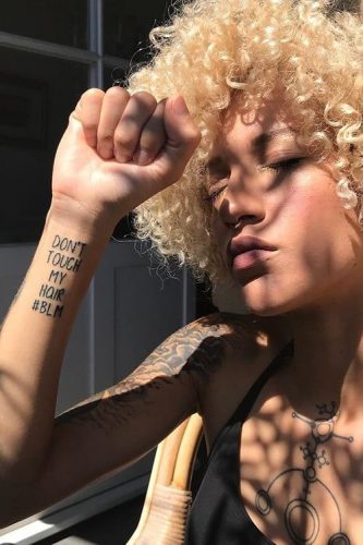 2024&#8217;s Top 20 Black Women Tattoos: Embracing Afro Heritage &#038; Feminine Strength