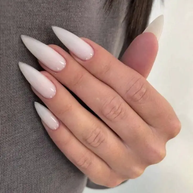 Milky white nails with elegant gold design – perfect inspo for 2025 beauty trends you’ll love